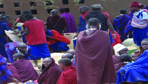 People in blue and red gathering